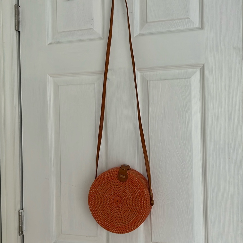 Orange woven round mini bag